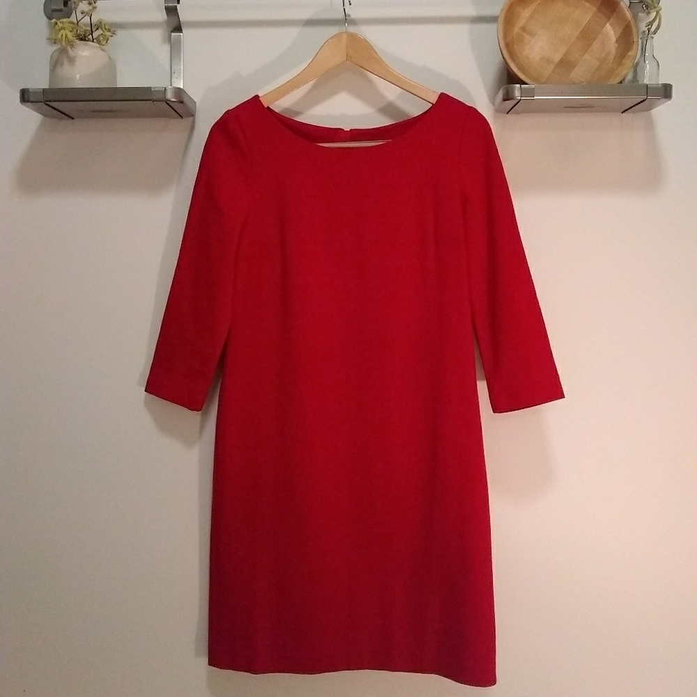 Red shift dress with gold accent zipper